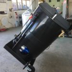 Installation de 2 roues pour déplacement par basculement vers l'arrière
