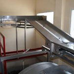 Ligne de convoyeurs de caisses - Champagne Cordoin-Didierlaurent
