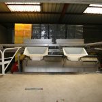 Ligne de convoyeurs de caisses - Champagne Ellner