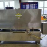 Laveuse LCPI de caisses à volaille avec tunnel dosatron