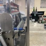 Convoyeur de déchargement des bouteilles